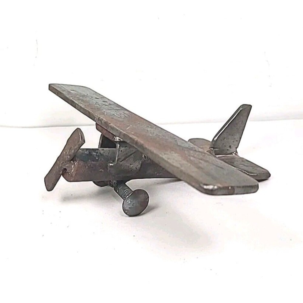 Vintage Scrap Folk Art Metal Handmade Airplane Sculpture 7.5" Wingspan steel